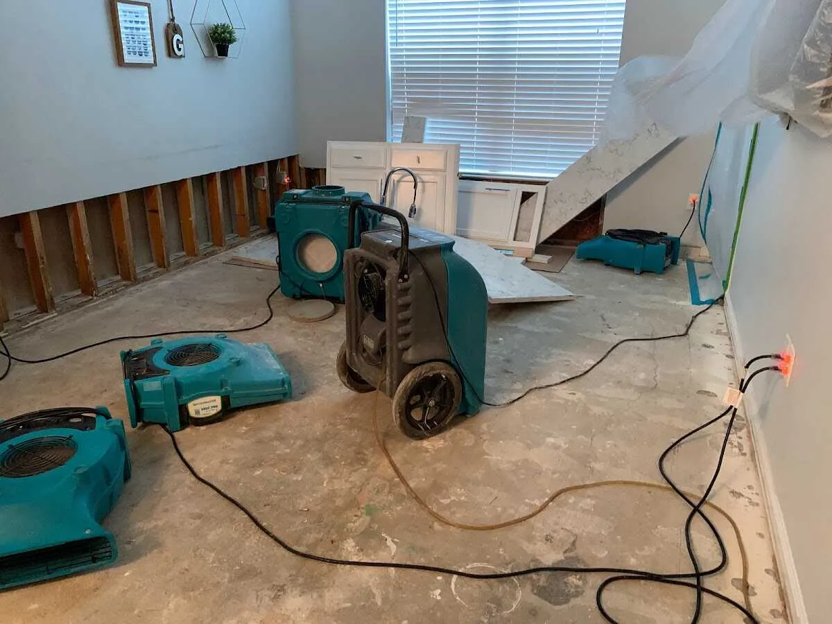 Dehumidifier in flood-cut room for Water Damage Restoration in St. Paul Park